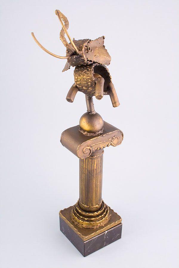 Statuett i metall -  MET017