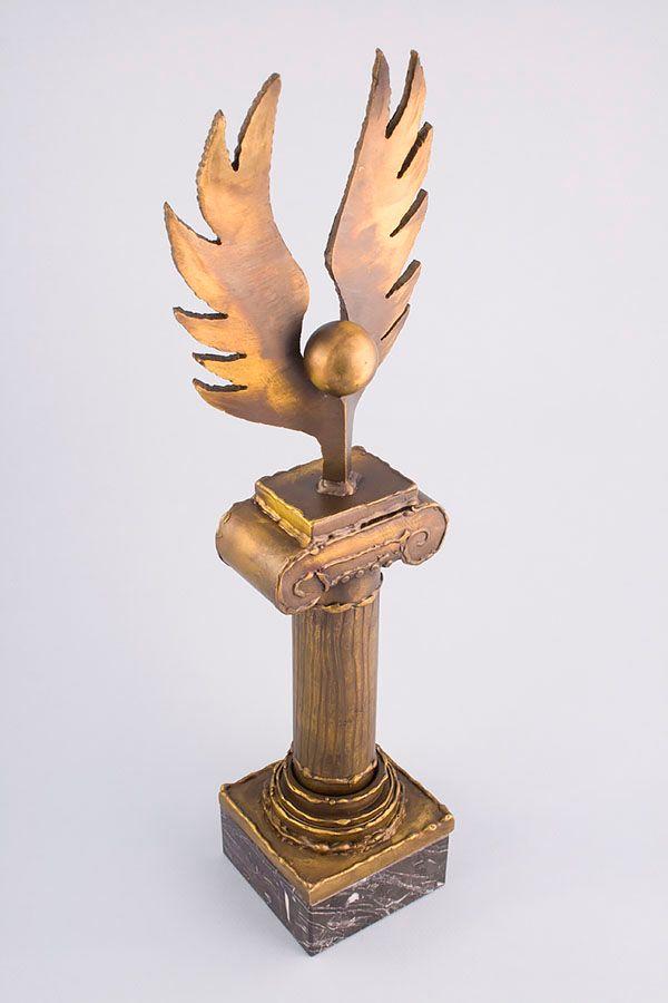 Statuett i metall -  MET003