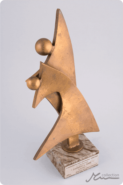 Statuett i metall -  MET052