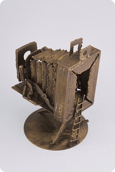 Statuett i metall -  MET065