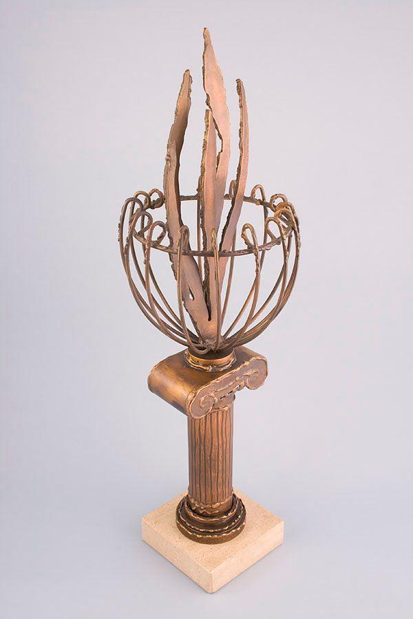 Statuett i metall -  MET006