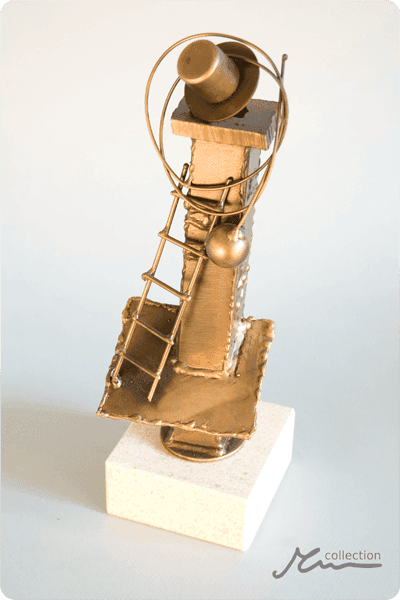Statuett i metall -  MET093