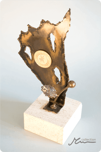 Statuett i metall -  MET095
